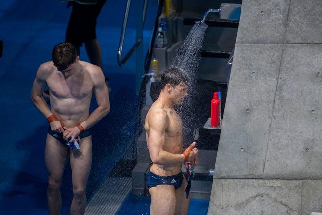 After leaving the water, athletes quickly shower.