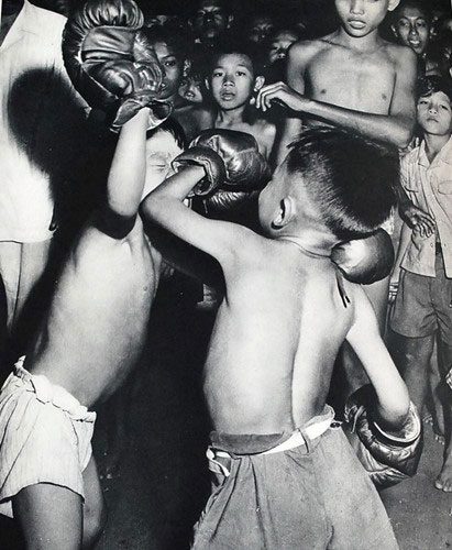 Children practicing boxing.