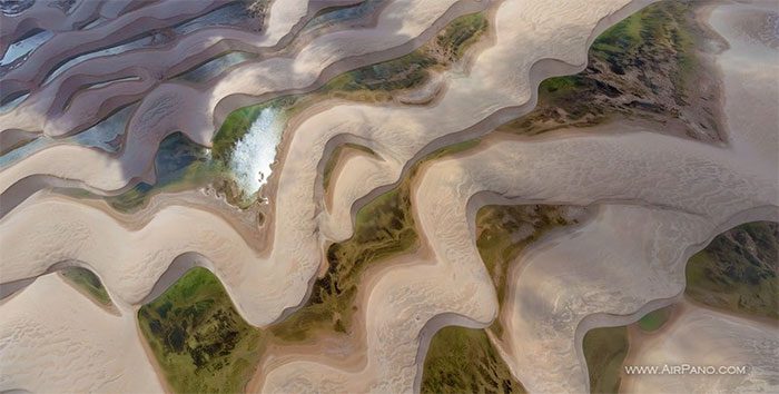 The landscape looks like enchanting bed sheets when viewed from above