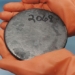 why scientists can touch uranium without need for protective clothing 123234