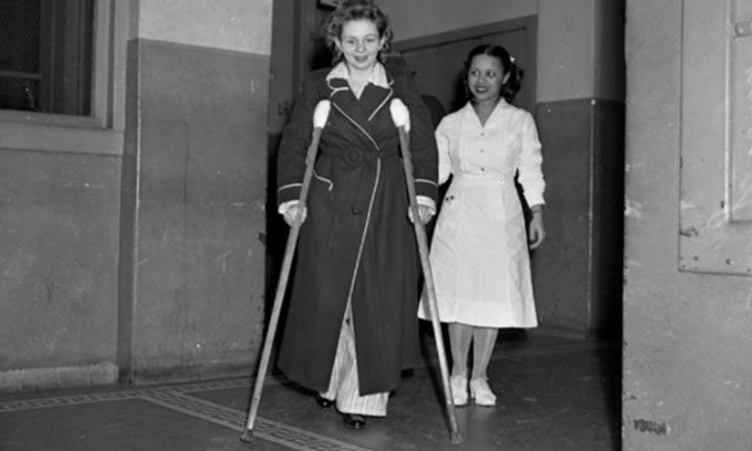 Betty Lou Oliver (using crutches) recovered after the accident for several months and lived another 54 years.