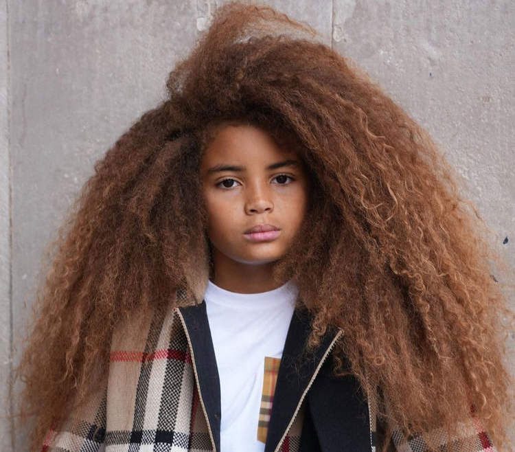 Farouk James with his impressive long hair.