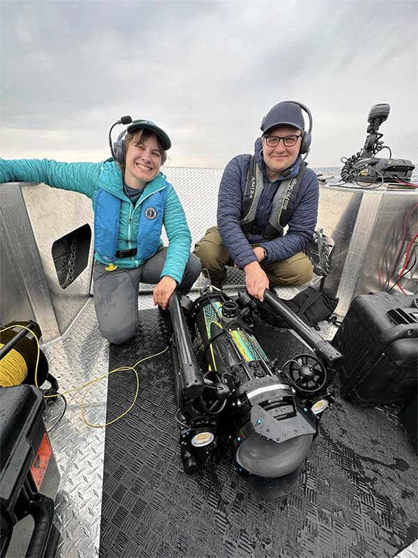Yvonne Drebert and Zach Melnick with their exploration robot