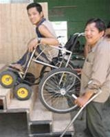 a disabled person successfully creates a wheelchair to climb stairs 4951