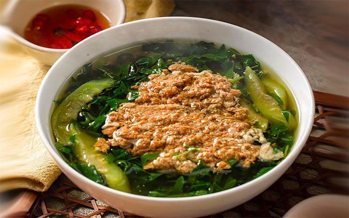 Crab soup with jute leaves and water spinach.
