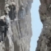 climbing the nuoc peak in china tourists choose to stand between the rocks 134277