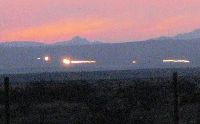 The Marfa Lights often appear as white or red glowing orbs