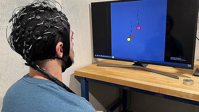 Participants in the experiment use their thoughts to move objects following the movement of a virtual target.