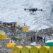 drone carrying china collecting trash on everest 134879