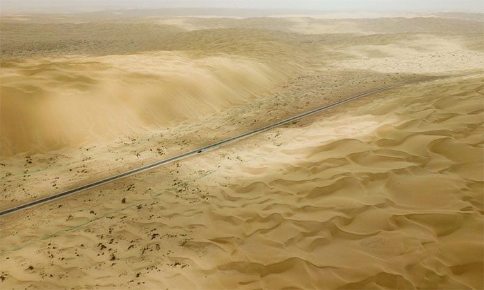 Aerial view of a new highway through the Taklimakan Desert on June 25, 2022.