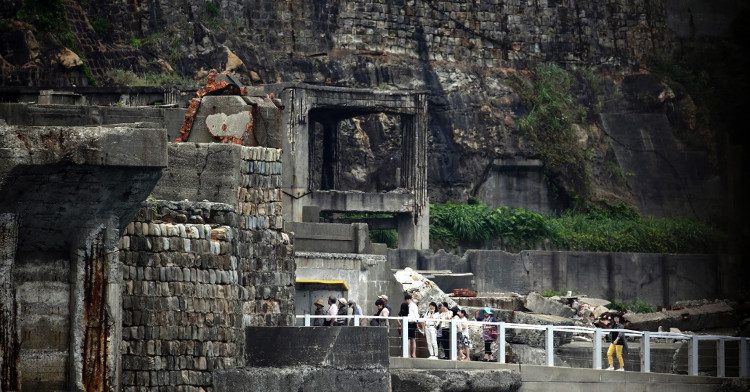 Visitors enjoying the eerie atmosphere on the ghost island.