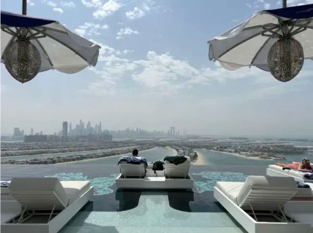 The infinity pool on the 22nd floor is a must-visit for guests.