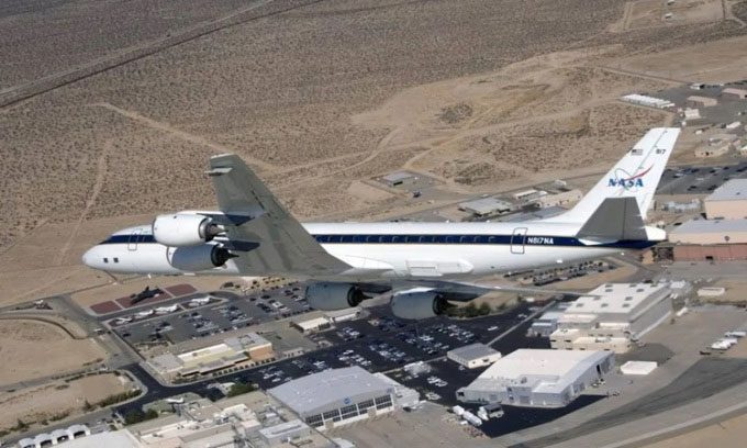 DC-8 flying over Dryden Flight Research Center.