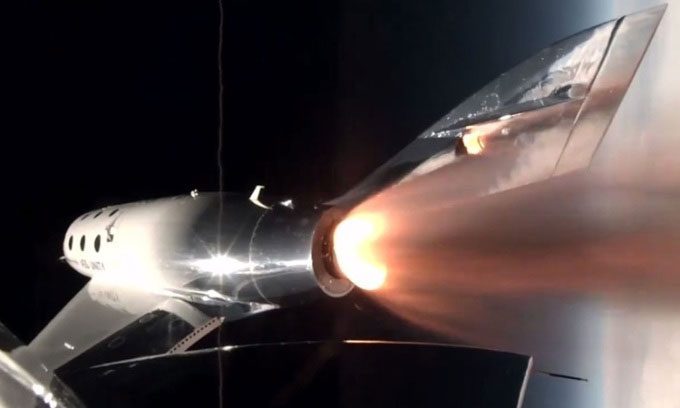 VSS Unity igniting its rocket during Galactic 07 mission.