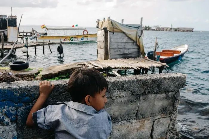 A boy playing near the shore on Gardi Sugdub Island.