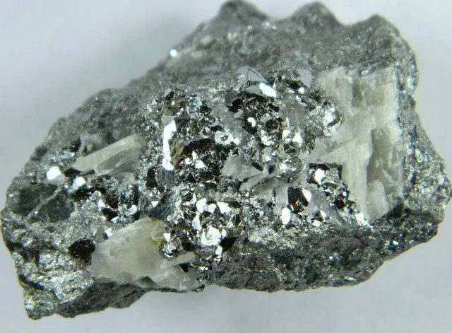 Nickel is a natural metallic element with a silver-white, shiny appearance.