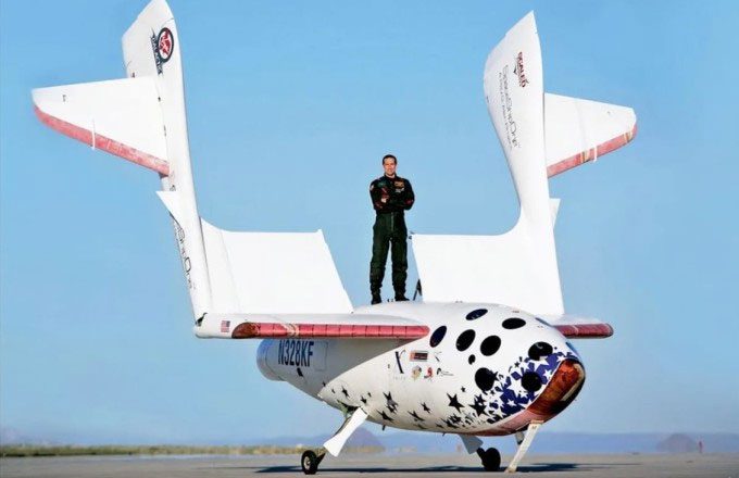 Pilot Brian Binnie stands above SpaceShipOne in 2004.