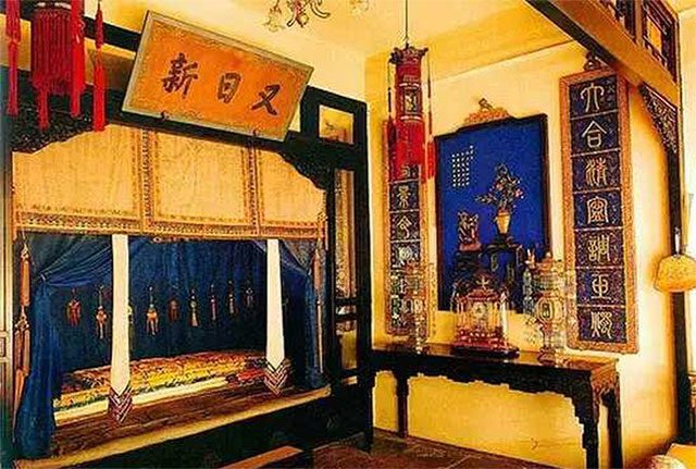 The emperor's bedroom and bed are both very small.