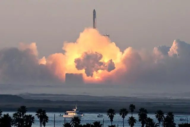 Super Heavy rocket carrying Starship spacecraft leaves the launch pad at Boca Chica