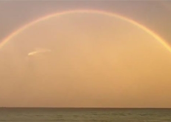 rainbow appears on beach in dania florida 134961