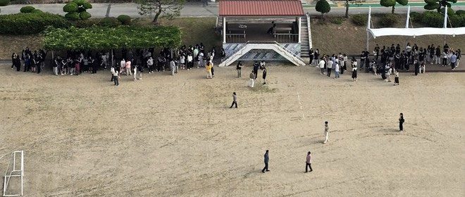 Students at a high school in Buan evacuated to the schoolyard.