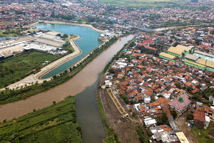 The Citarum River flowing through Bojongsoang Subdistrict in southern Bandung.