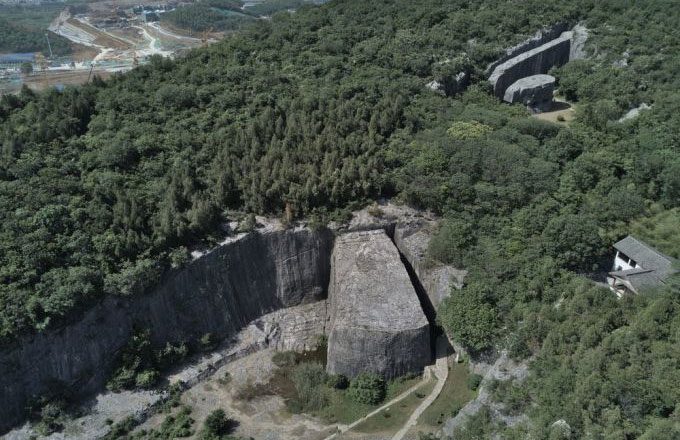  The base of the stone monument (near the center of the image), the body and the top (upper right corner). 