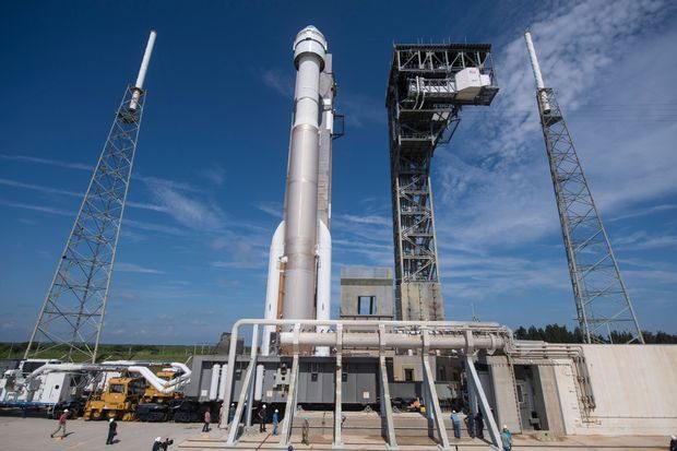 Atlas V rocket with Starliner spacecraft on the launch pad