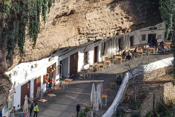 The massive rock seems ready to collapse at any moment