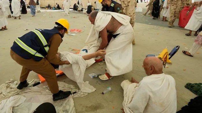 Heatstroke patients receiving medical attention.