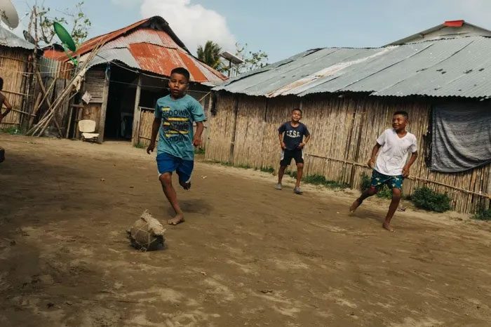 Children playing soccer on Gardi Sugdub Island.