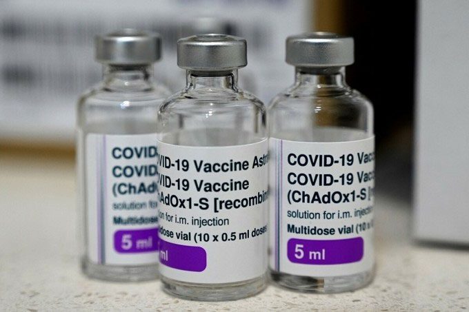 Empty AstraZeneca vaccine vial on the counter of a Covid-19 vaccination center