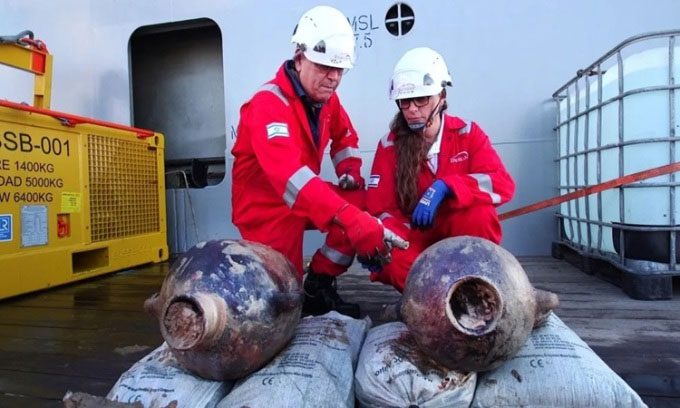 Ancient two-handled jars recovered from the shipwreck.