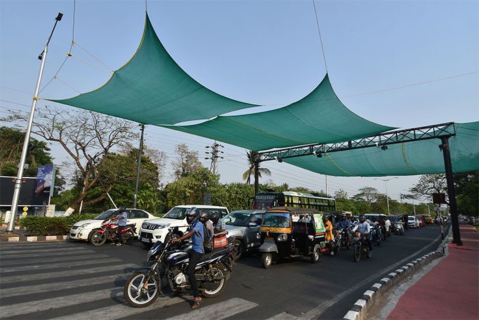 Vehicles traveling on the road in hot weather in Bhubaneswar, India on May 2.
