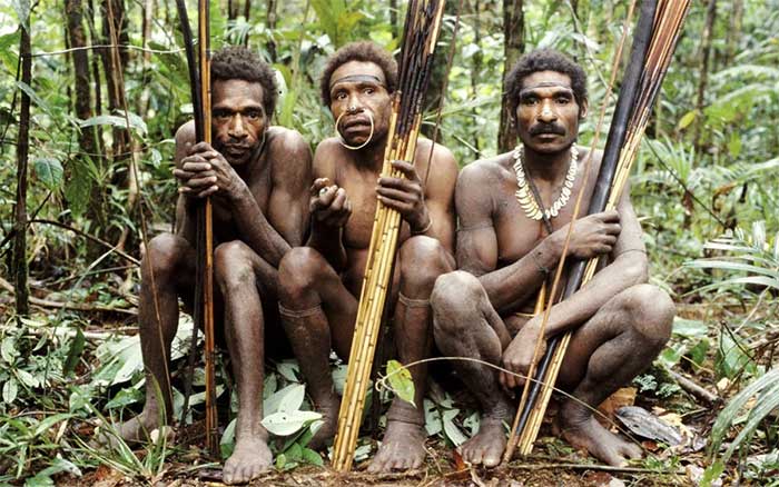 The Korowai have long lived in isolation, often building homes high in the trees.