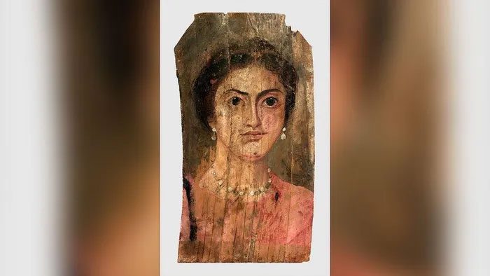 The portrait was painted on wood around the mid-2nd century AD.
