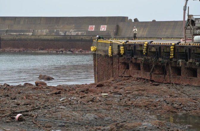 Traces next to structures at Kaiso fishing port