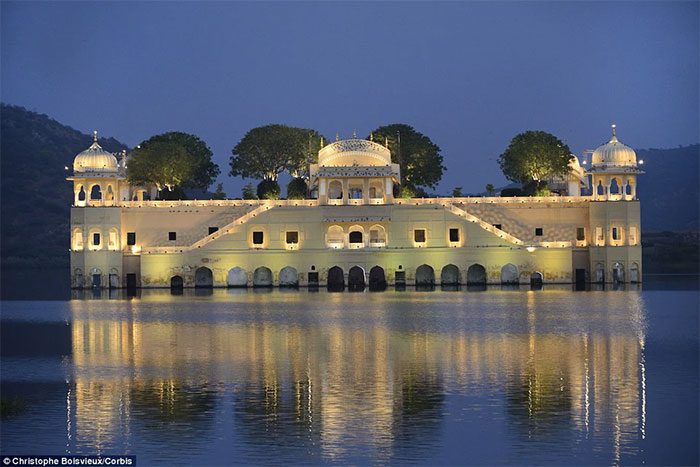 Jal Mahal shines brightly when illuminated.