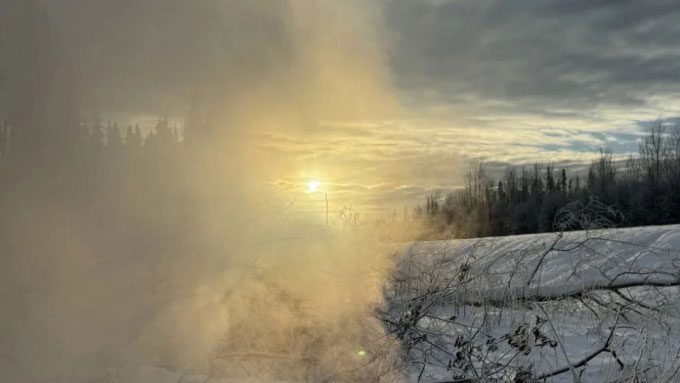 Smoke rising from a zombie fire in Fort Nelson, British Columbia.