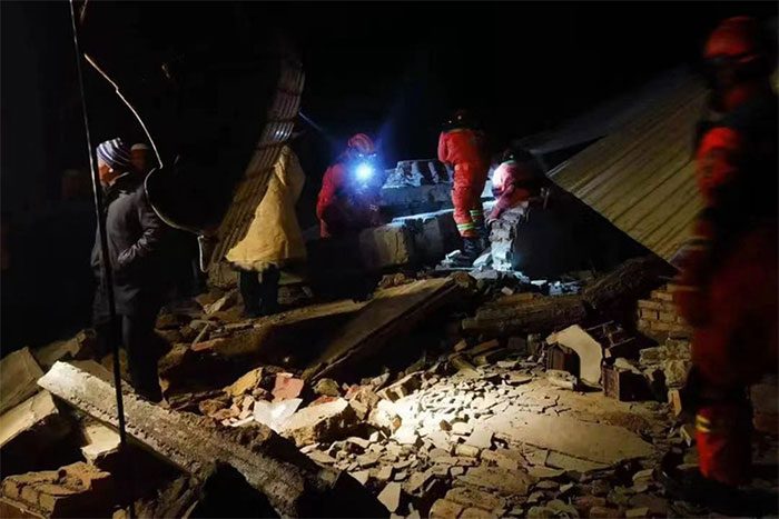 The earthquake occurred due to the collision of the Indian-Australian and Eurasian tectonic plates.