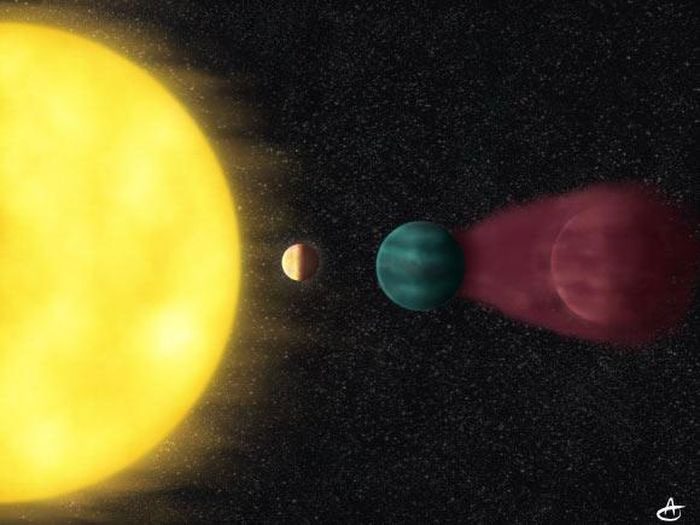 The HD 63433 star system with HD 63433d, the planet closest to its parent star, is tidally locked