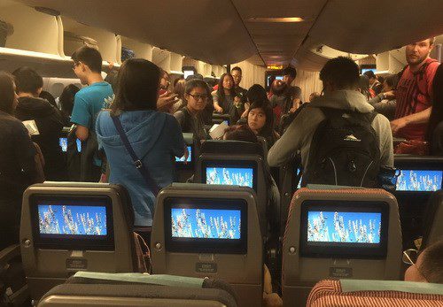 Where is the safest place to sit on a plane?