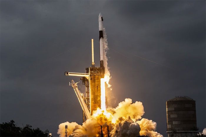 SpaceX Falcon 9 rocket carrying Dragon spacecraft with Ax-3 crew