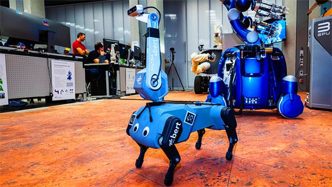 Dog-like robot Bert receiving control assistance from an astronaut in space