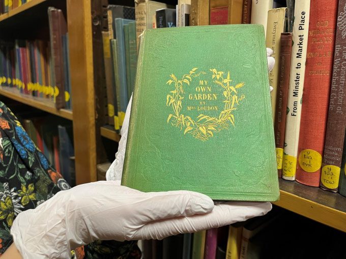 Old 19th-century books with green fabric covers are being called for recovery.