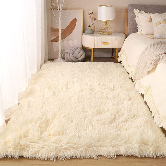 Rugs and curtains can also help make the space warmer