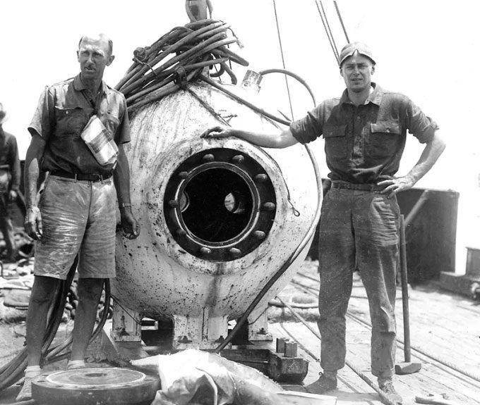 William Beebe (left) and Otis Barton (right) with the Bathysphere