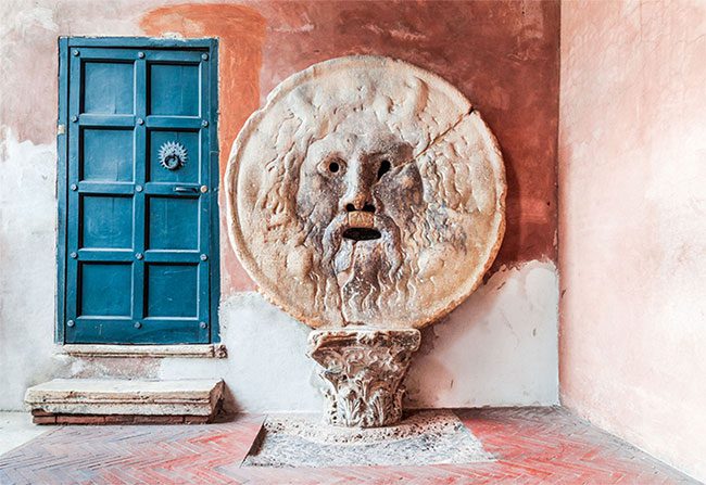 The “Mouth of Truth” is a carved stone disc depicting a human head.