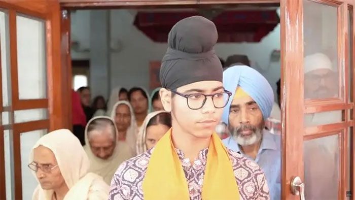 Usually, Chahal ties his hair up and covers it with a traditional turban.