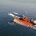automatic rescue boat saving people about to drown 131008